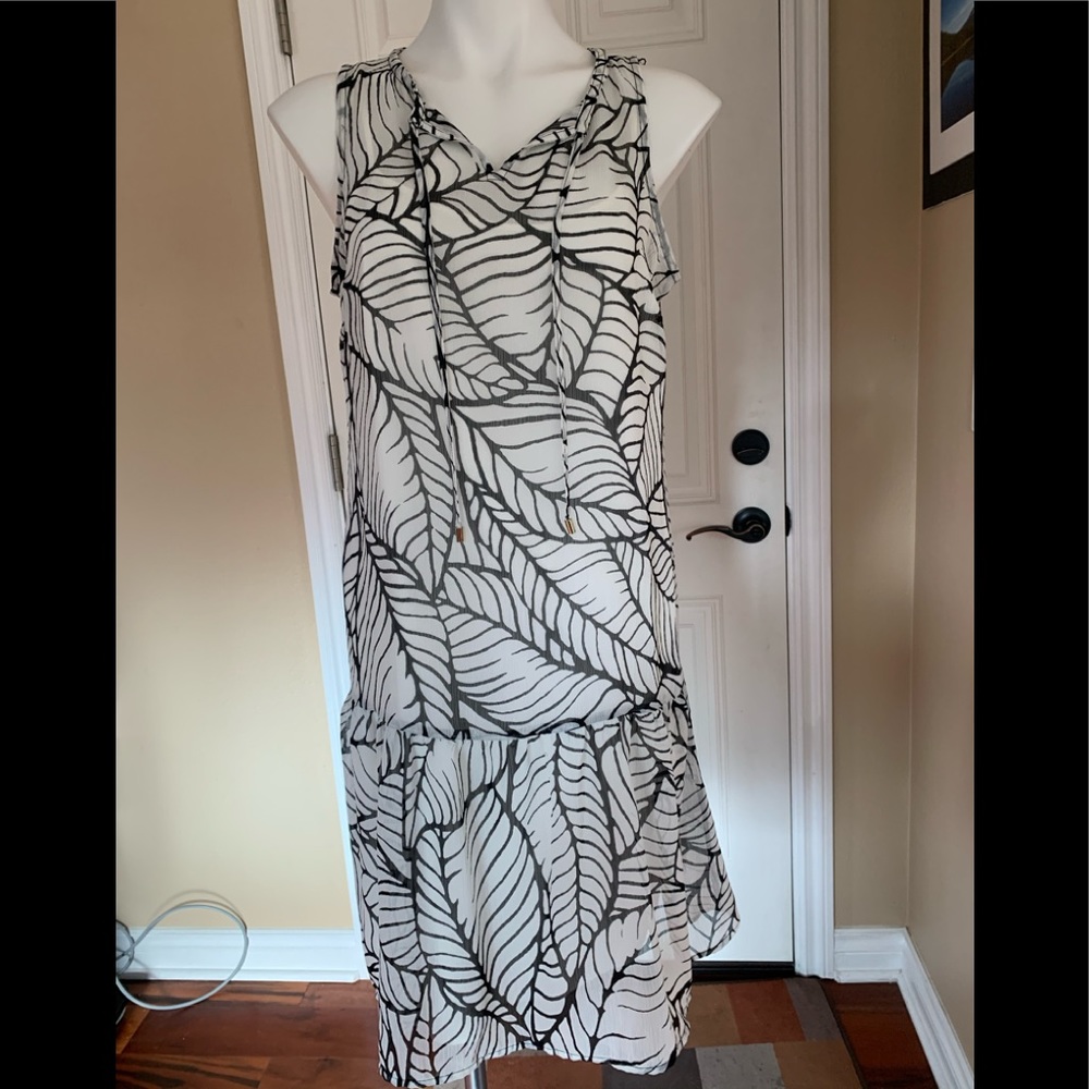 A brand new with tags sleeve less black and white dress